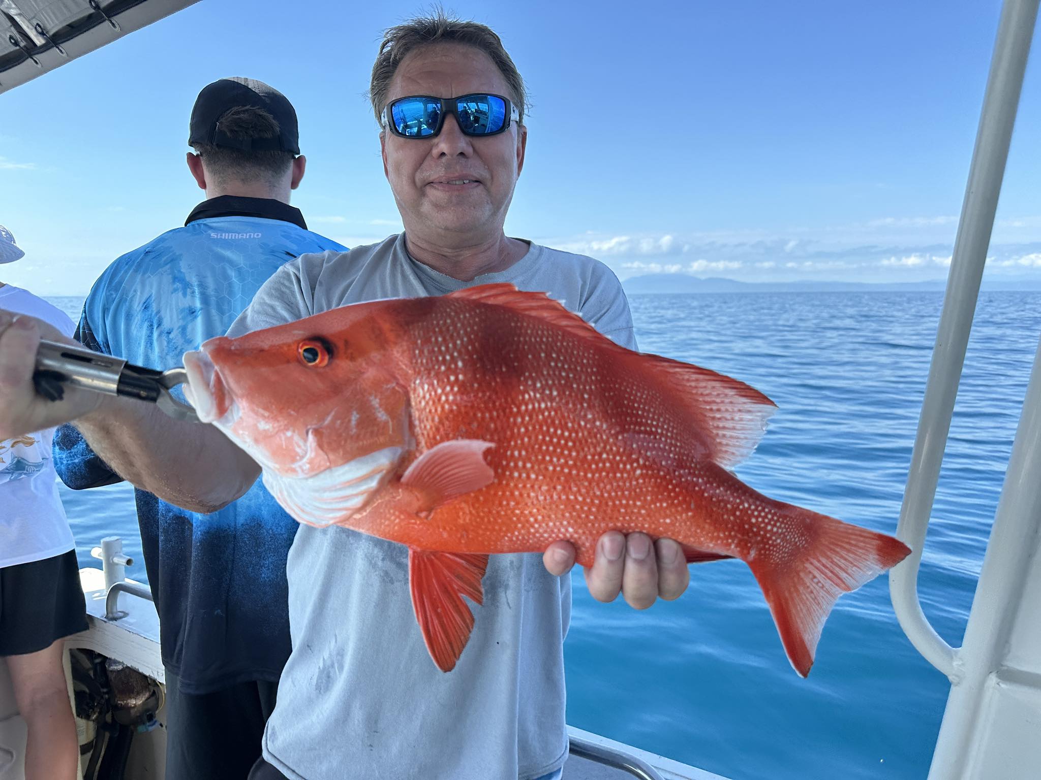 Angler with a huge Red Emperor