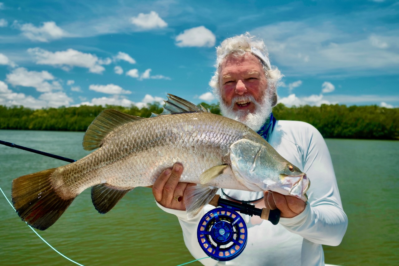 Happy angler showing off a large catch